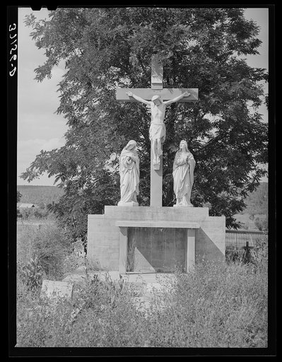 Monument in Catholic cemetery, Penasco, New Mexico. The monument was donated by a local rich man