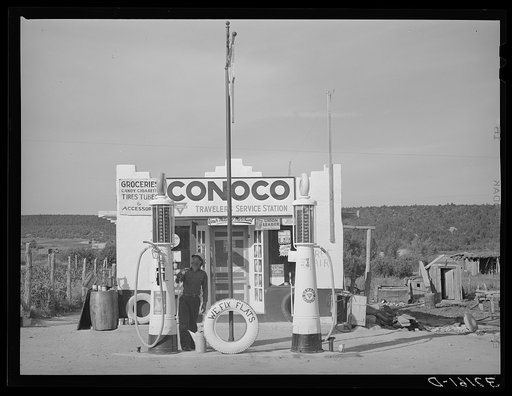 Filling station is only building of modern design in the Spanish-American village of Penasco, New Mexico