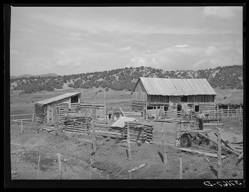 Barns and outbuildings of Spanish-American farmer. Chamisal, New Mexico
