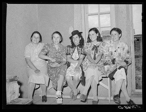 Spanish-American women waiting to see doctor at the traveling clinic at Chamisal, New Mexico
