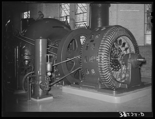 Water turbine and electric generator at municipal power plant. Logan, Utah