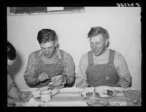 Mormon farmers at dinner table. Box Elder County, Utah