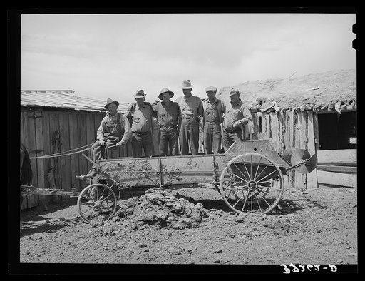 Box Elder County, Utah. Members of the FSA (Farm Security Administration) cooperative manure spreader