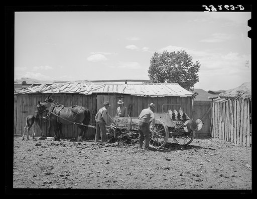 Untitled photo, possibly related to: Members of FSA (Farm Security Administration) cooperative manure spreader. Box Elder County, Utah