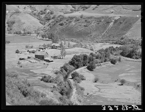 Farmstead and irrigation ditch on outskirts of Logan, Utah