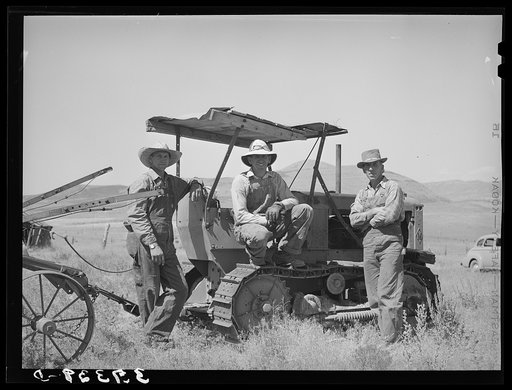 The Ericson brothers and their cooperative tractor bought with a FSA (Farm Security Administration) loan. Box Elder County, Utah