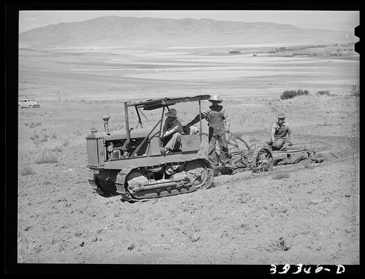 Ericson brothers' FSA (Farm Security Administration) cooperative tractor in action. Box Elder County, Utah