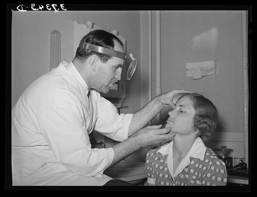Doctor of FSA (Farm Security Administration) medical cooperative examining FSA rehabilitation borrower. Box Elder County, Utah