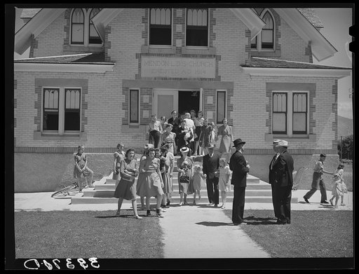 Congregation leaving the Latter Days Saints Church at Mendon, Utah