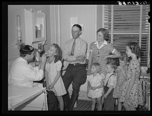 Untitled photo, possibly related to: Doctor with family who are members of the FSA (Farm Security Administration) medical cooperative. Box Elder County, Utah