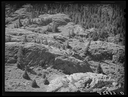 Rocks in the Uncompahgre River Valley, Ouray County, Colorado. Water from this river is used for irrigation and gold mining and milling operations