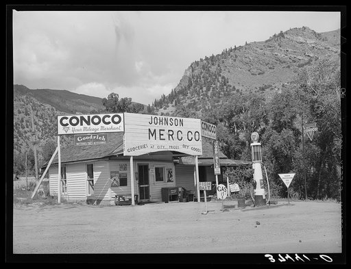 Grocery store and filling station at Cimarron, Colorado. This is a sheep shipping center