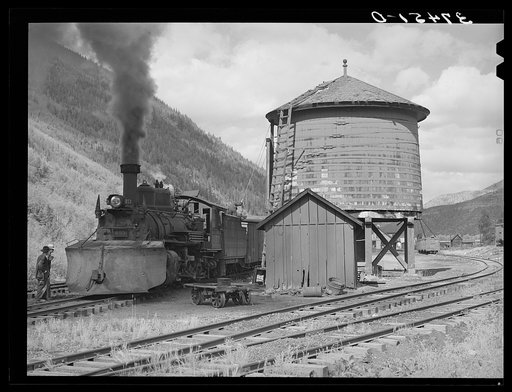 Untitled photo, possibly related to: Narrow gauge railway yards, train and water tank at Telluride, Colorado