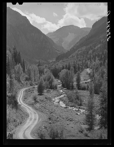 Untitled photo, possibly related to: Mountain stream and road. Ouray County, Colorado