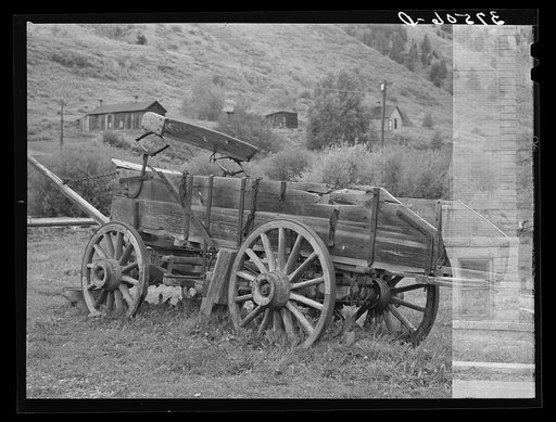 Untitled photo, possibly related to: Old wooden ore wagon. Telluride, Colorado. Ore is now transported by trucks