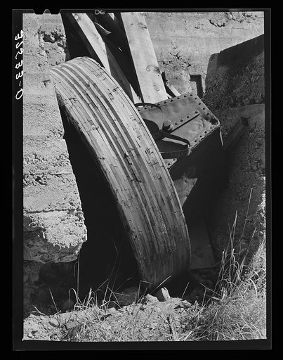 Untitled photo, possibly related to: Abandoned equipment at gold mill showing laminated wooden wheels. Telluride, Colorado