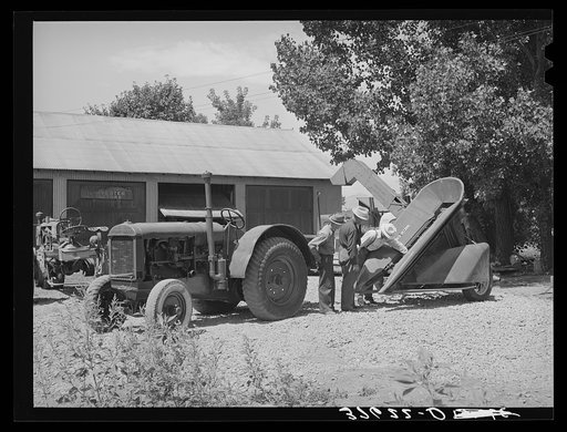 Tractor and corn machinery bought by Cornish corn machinerycooperative. Preston, Idaho. This is a FSA (Farm Security Administration) cooperative