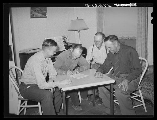 Committee of Cornish corn machinery cooperative signing an agreement for purchase of machinery. Cornish, Utah