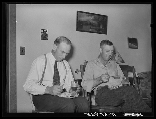 Mormon farmers having refreshments of watermelon and fruit punch after cooperative FSA (Farm Security Administration) meeting. Box Elder County, Utah