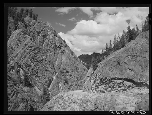 The Million Dollar Highway between Silverton and Ouray is cut through massive rock formations. Ouray County, Colorado