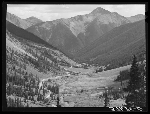 Million Dollar Highway going through mountain valley before entering Silverton. San Juan County, Colorado