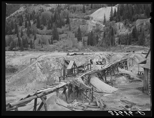 Detail of abandoned mine in San Juan County, Colorado. This section which was once a boom mining section is now covered with the crumbling, rotting remains of mines and mills