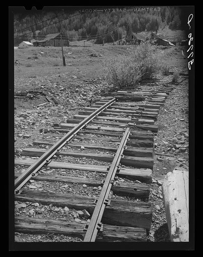 Untitled photo, possibly related to: Abandoned railroad leading to abandoned mine. San Juan County, Colorado. When the mines moved out, whole towns and affiliated industries folded up