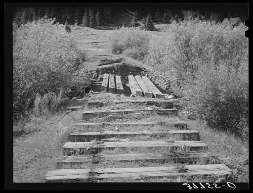 Rotting ties of abandoned railroad in San Juan County, Colorado. When the mines were abandoned, all activity in the towns and valleys was at a standstill