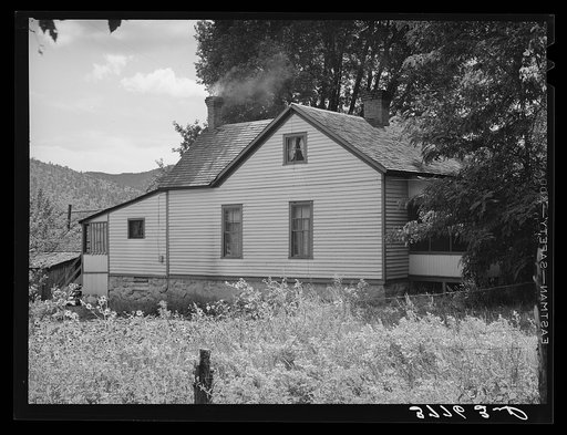 Home of farmer in Animas River Valley. La Plata County, Colorado