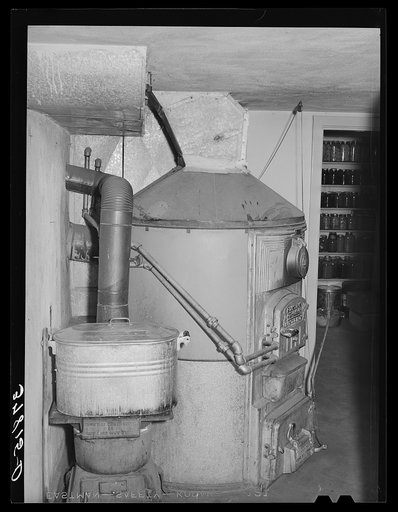 Many of the farmers living in Santa Clara, Utah, have central heating plants in their homes. This is one of the home furnaces