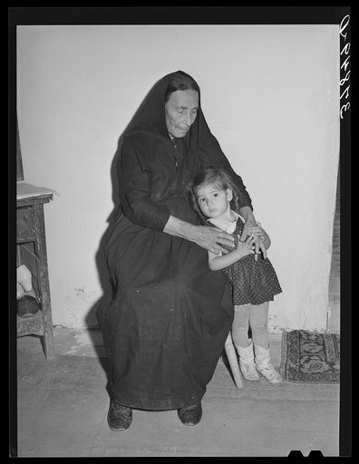 Woman of Spanish extraction with her grandchild. Concho, Arizona