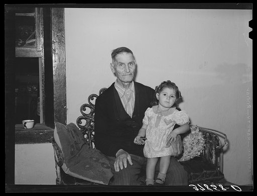 Man of Spanish extraction and his grandchild. Concho, Arizona