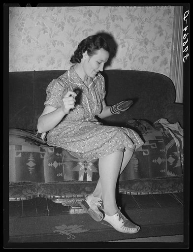 Wife of Mormon farmer mending. Santa Clara, Utah. See general caption