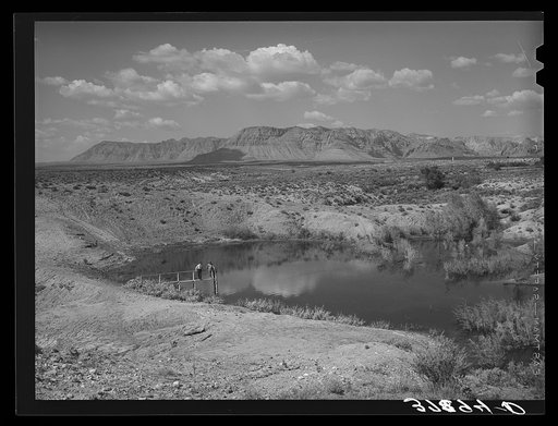 Irrigation water reservoir of FSA (Farm Security Administration) clients. Washington County, Utah