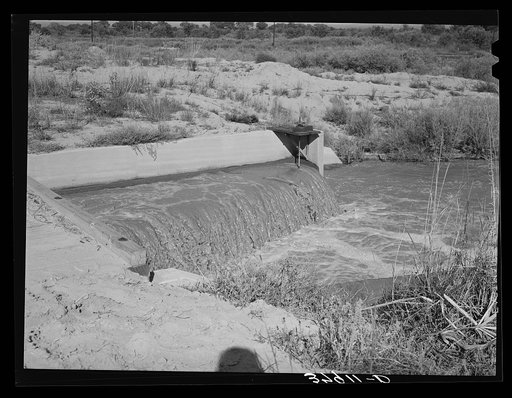Water in irrigation canal. Bernalillo County, New Mexico