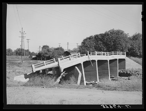 Bridge in Tehama County, California, which was washed out in recent flood of the Sacramento River. Shasta Dam will control a large amount of these flood waters