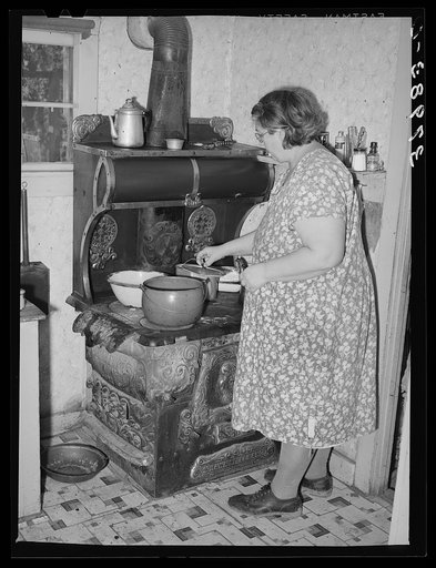Wife of Jo Webster cooking lunch. Tehama County, California