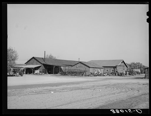 Truck and tractor repair storage shops are centrally located at the Earl Fruit Company ranch. Kern County, California