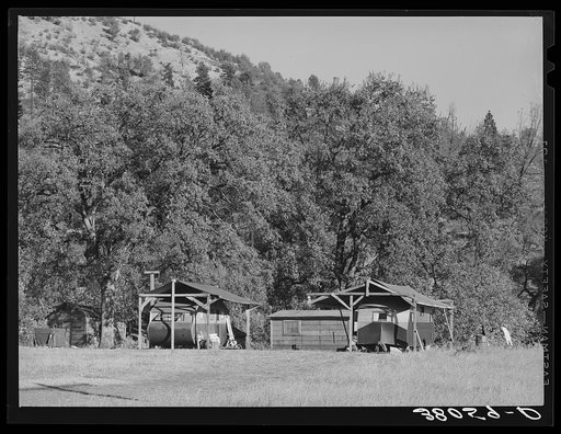 Workers at Shasta Dam have moved in their trailers, built a lean-to and established themselves for duration of work. Near Project City, California