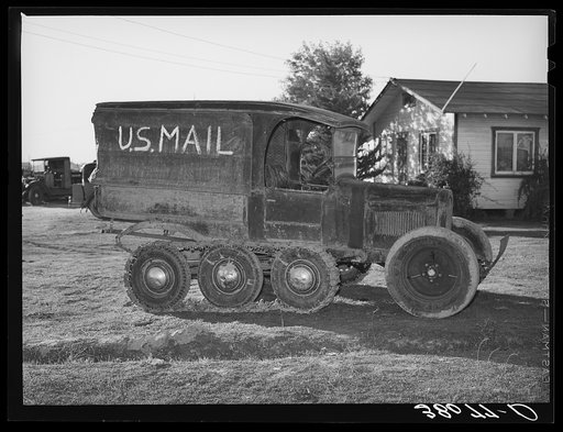 Untitled photo, possibly related to: U.S. mail truck used in snowy mountain sections of Nevada County, California