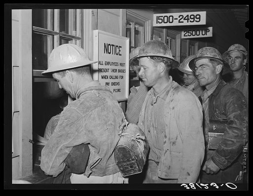 Construction workers being paid off. Shasta Dam, Shasta County, California