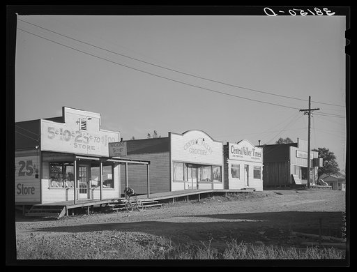 Untitled photo, possibly related to: Some of the business enterprises at Central Valley, California. This section of the town has lost business because the main highway was enrouted and left it stranded. Central Valley is one of the boom towns near Shasta Dam