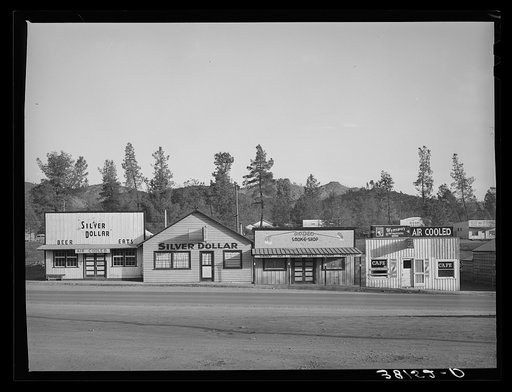 Business enterprises on main street on Central Valley, California, boom town near Shasta Dam
