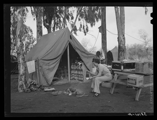 Untitled photo, possibly related to: "We're living in a tent because we wouldn't pay anyone thirty or thirty-five dollars for a two-room bug trap." Mission Valley, California, which is about three miles from San Diego
