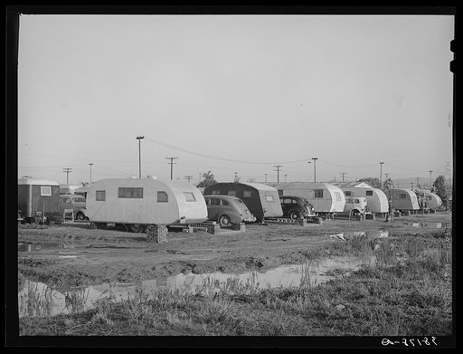 Sunset Trailer Camp, San Diego, California. The majority of the workers who have come into San Diego are apparently living in trailers. The county passed stringent sanitary laws when migratory agriculture workers came into the section some years ago and these laws prevent the Hooverville type of set