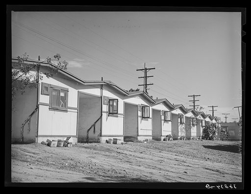 Tourist court which caters to employees of defense industries. San Diego, California. Rental fees at these courts are from five to ten dollars a week, usually eight dollars, and include small room, bath and kitchenette equipped with two burner gas plates. No vacancy signs are frequent