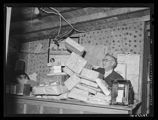 Sorting the incoming Christmas mail at trailer court. Corpus Christi, Texas. These trailer courts have become regular small communities