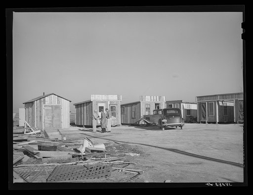 Tourist courts built of second hand lumber. Corpus Christi, Texas. These are on North Beach and were constructed to accommodate workmen at the naval air base
