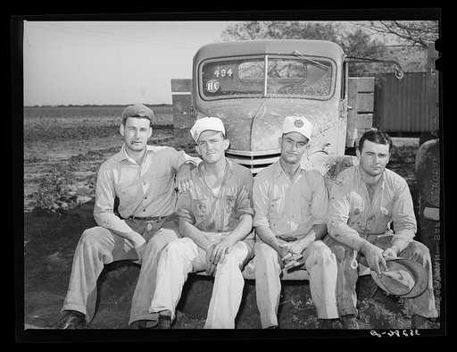Four truck drivers who work at the naval air base now under construction. Corpus Christi, Texas