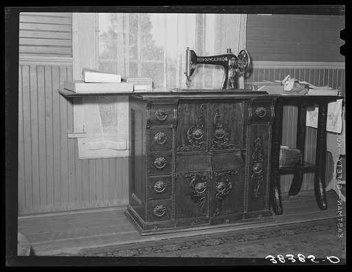 Sewing machine in house of fruit farmer. Placer County, California